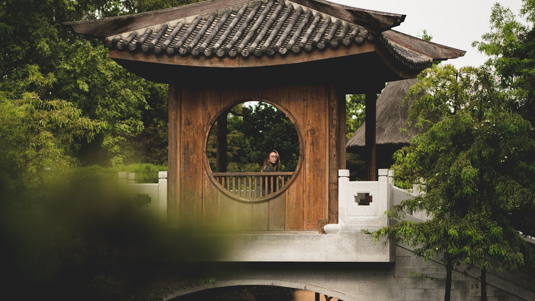 Wooden gazebo structure in a backyard, illustrating the difference between gazebos, pergolas, and carports